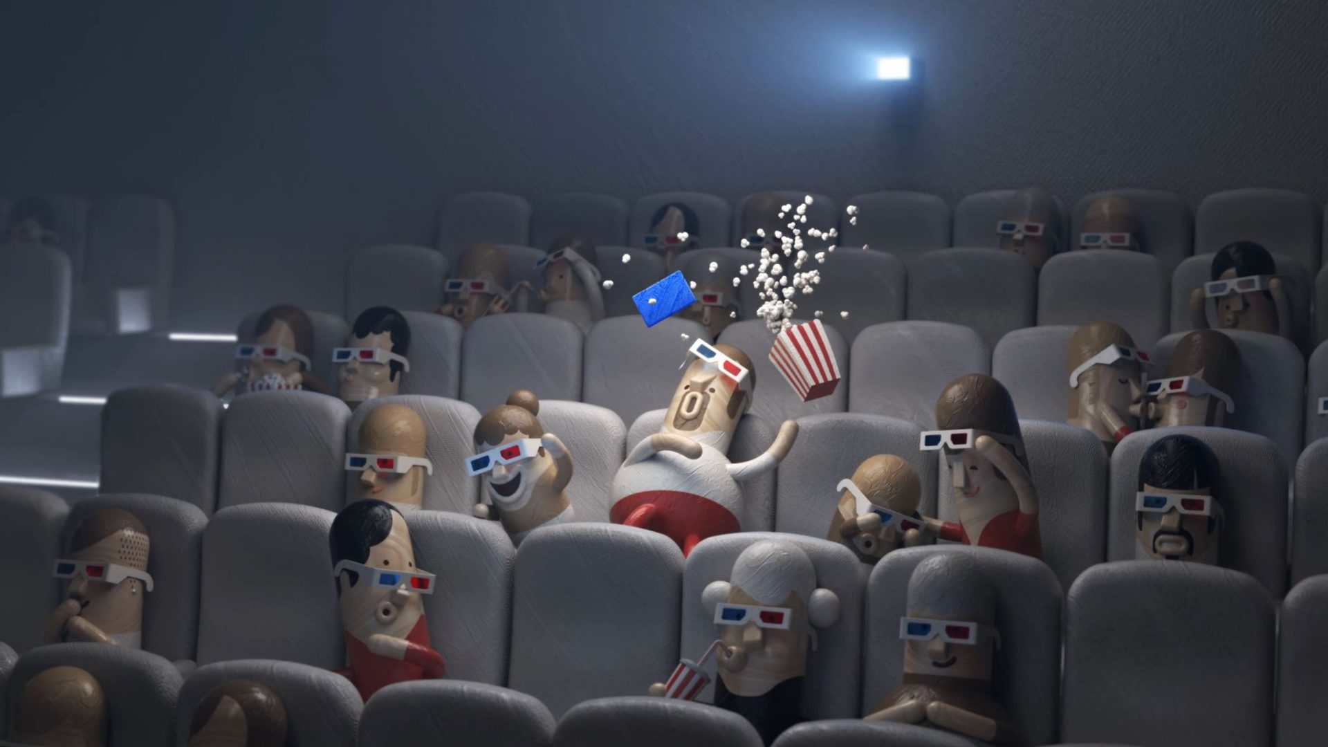 Holzfiguren in einem dunklen Kinosaal, in dem eine blaue Vorteilskarte zwischen 3D-Brillen, Popcorn und Miniaturcharakteren im Mittelpunkt der Szene schwebt