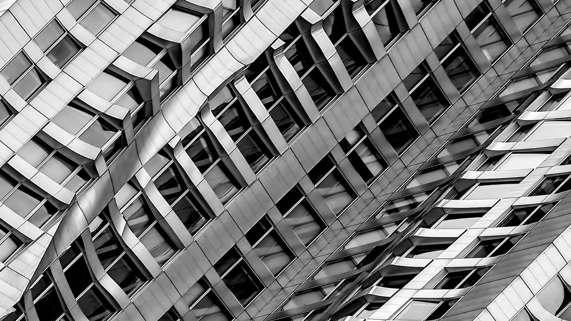 Abstrakte Architekturaufnahme in Schwarz Weiß fotografiert von Wuger für ein visuelles Eventkonzept im Bereich Motion Design und Storyinszenierung