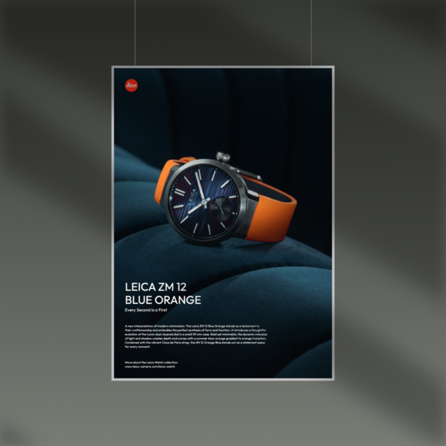 Hängendes Poster einer Leica ZM 12 mit orangefarbenem Band als visuelle Sprache für eine Produktkampagne von Wuger